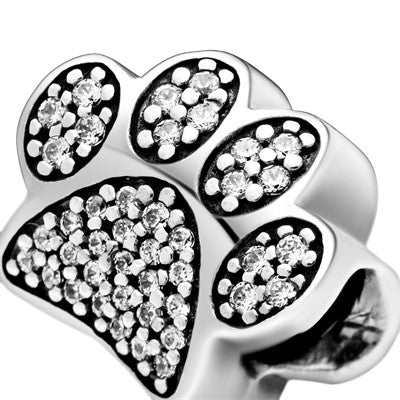 Paw silver charm with cubic zirconia